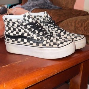 Platform checkered vans.They are  a women’s size 9 and a MEN’S size 7.5.